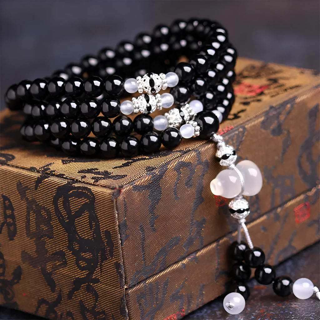 Black agate stone bead bracelet with 108 geometrically shaped beads and number element details