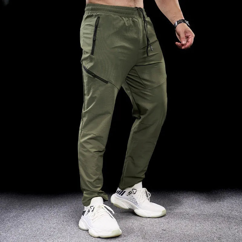 Men's waterproof quick-dry nylon workout pants in multiple colours with mid-waist trousers length design