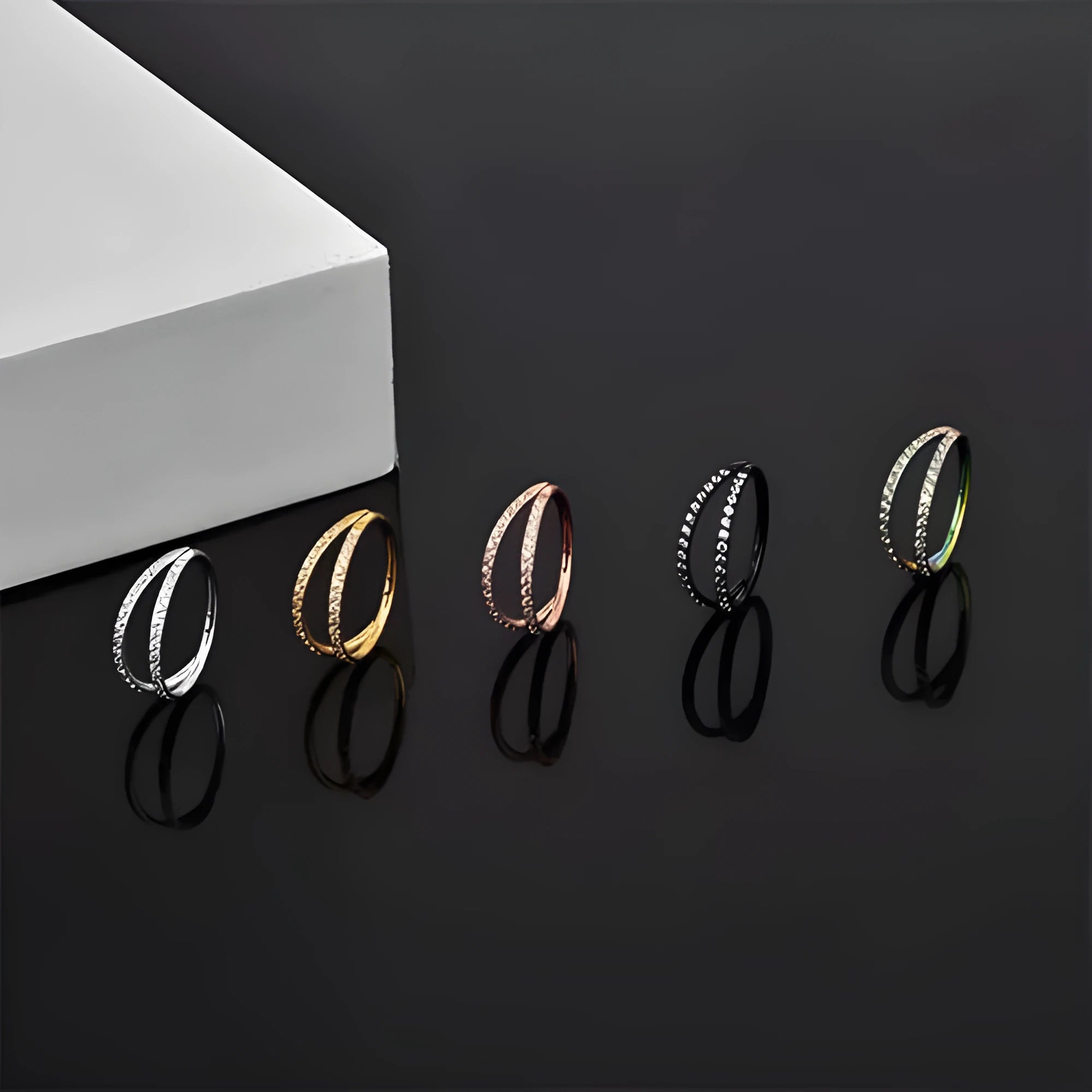 G23 titanium alloy lip ring and nose ring with diamond-cut finish in gold or steel colour.