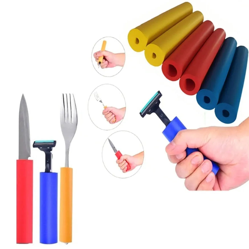 Set of black rubber grip hoses for organising tableware and pen handles in a drawer.