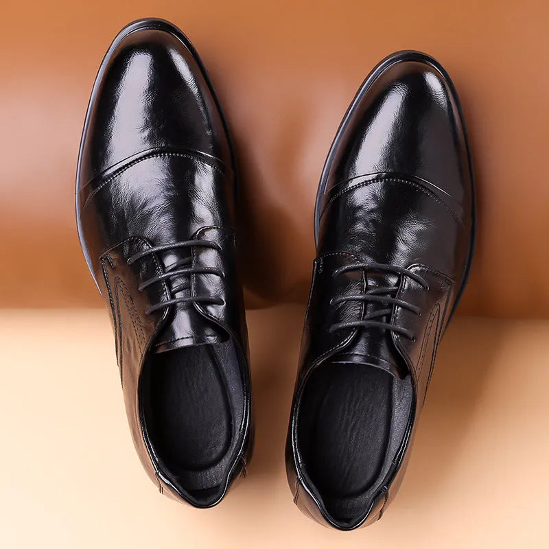 Men's business formal leather shoes with cow split leather upper, pointed toe, black colour, low shoe height on a white background