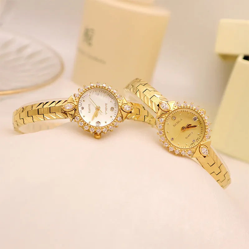 Vintage gold-toned ladies bracelet watch with diamond embossed links and quartz movement