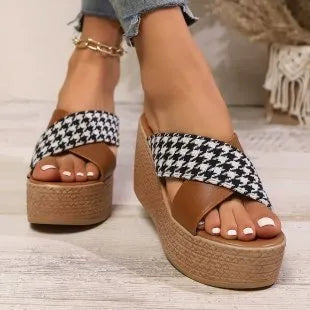 Cross leopard plaid wedge sandals in black or brown with rubber sole and plastic construction