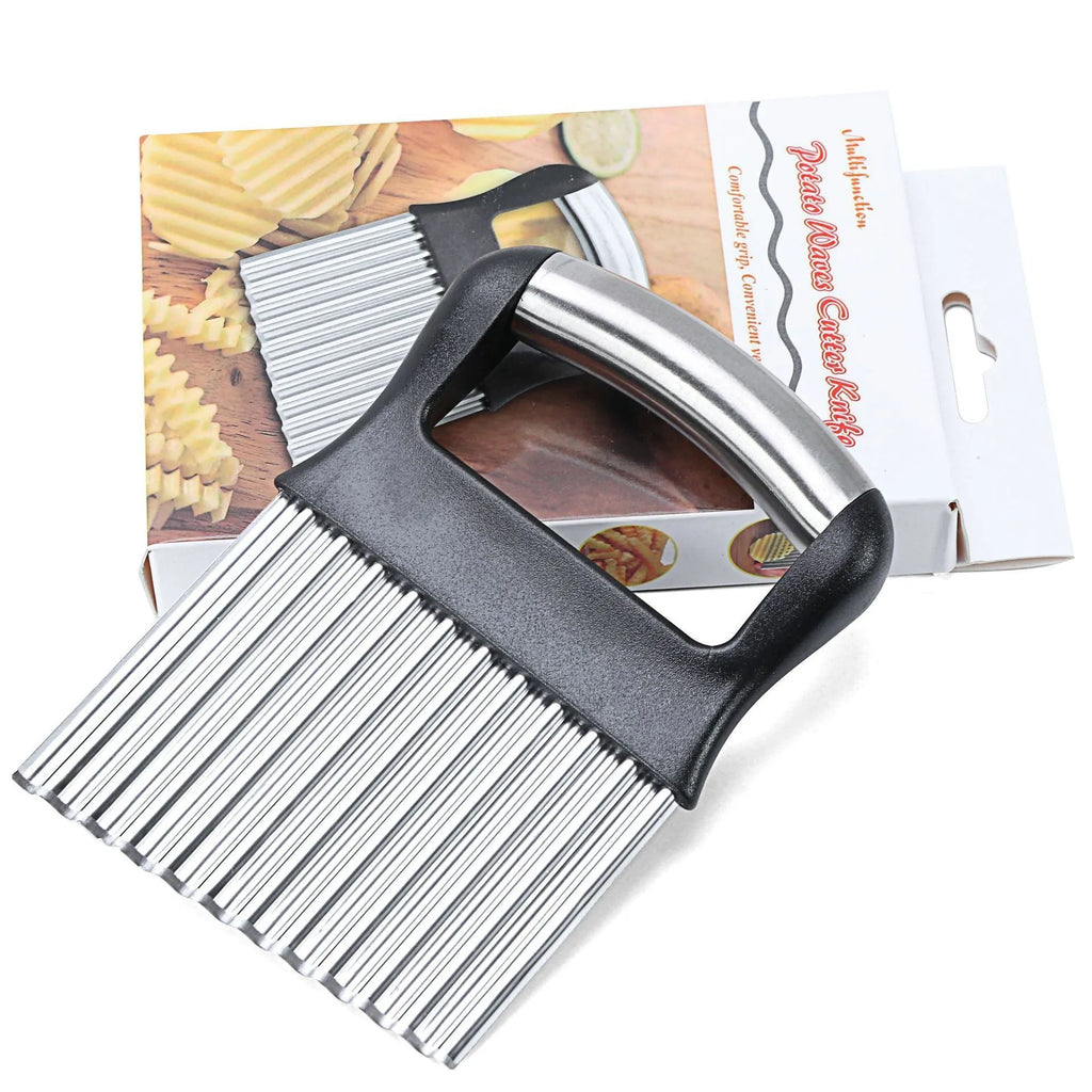 Stainless steel potato wave knife with corrugated blade on a kitchen counter.