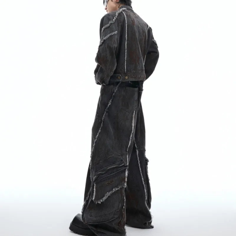 Distressed black denim coat with padded shoulders, gradient splash-dye pattern and matching trousers laid flat