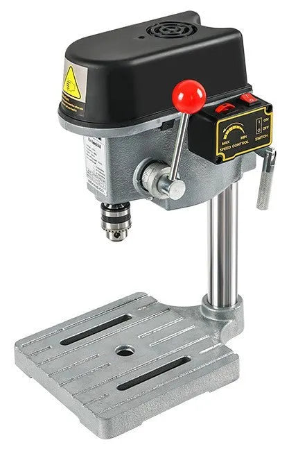 Bench-mounted drilling and milling machine with cross bench pliers and heavy-duty bench pliers.