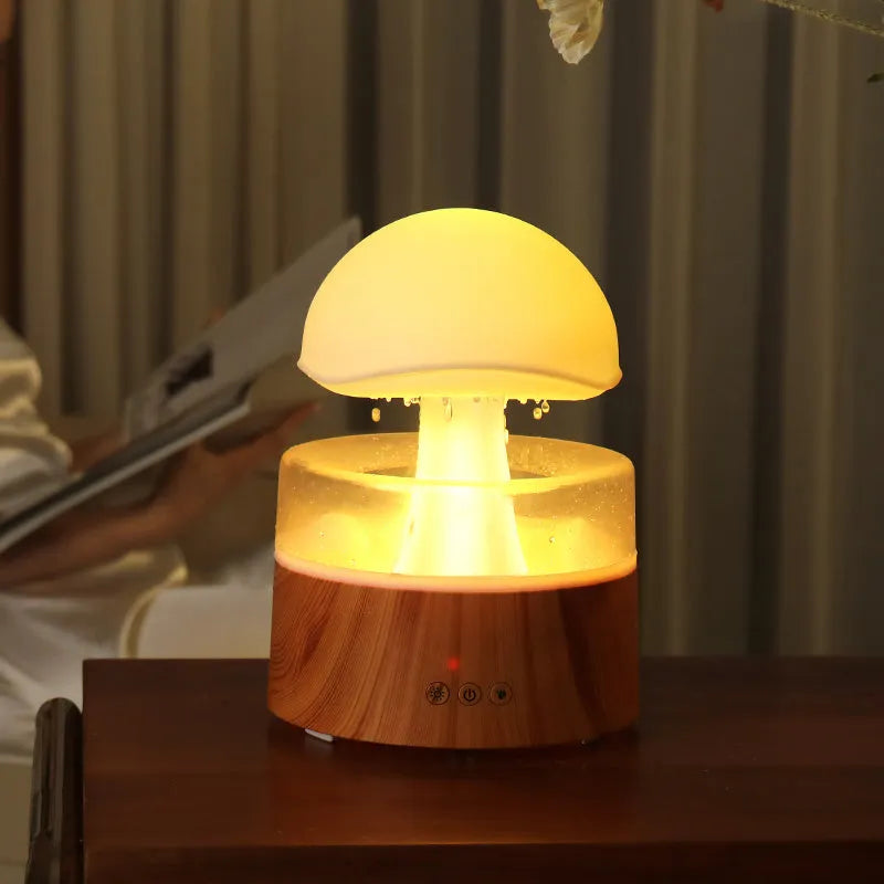 White rain cloud humidifier with falling raindrop effects and LED lighting
