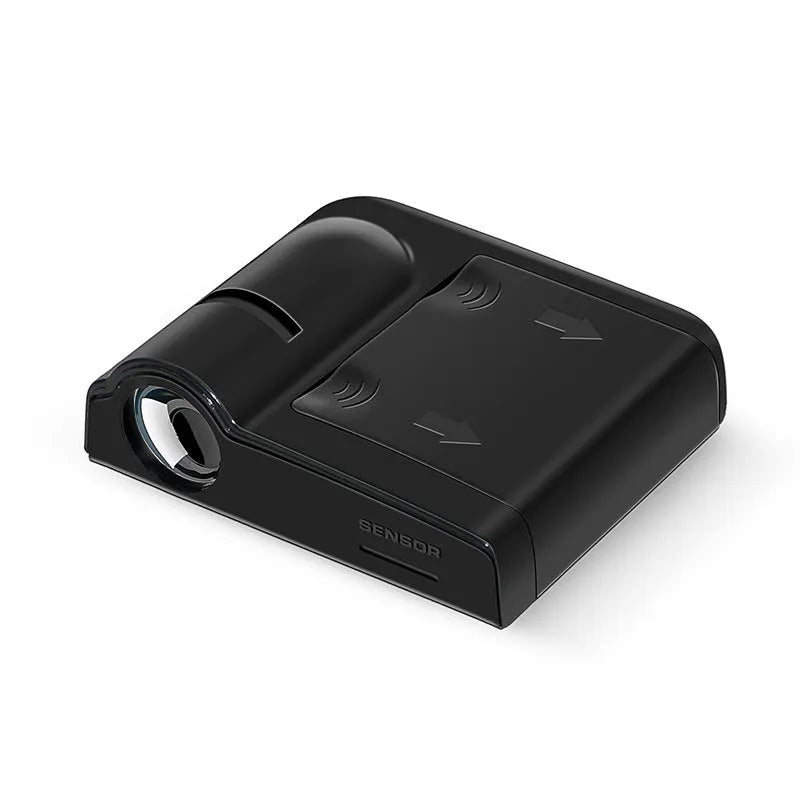 Compact black and beige ABS plastic car decorative projection radium lamp with battery compartment.