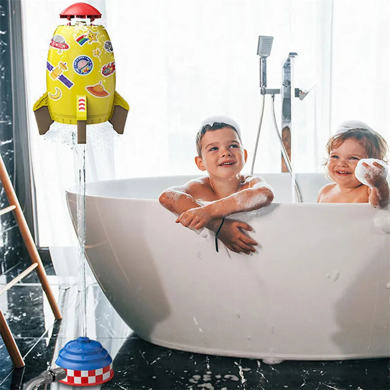 Yellow water pressure rocket launcher toy with base and interface connectors for outdoor garden play