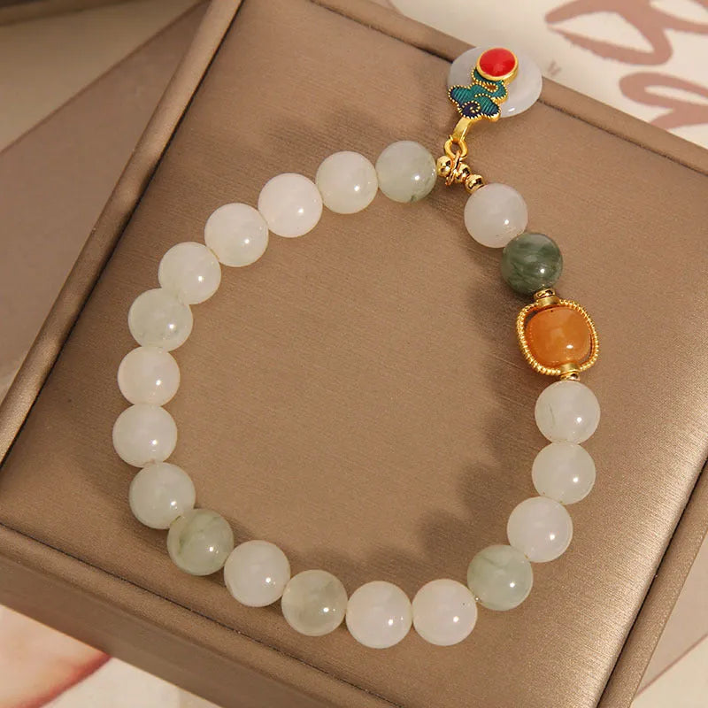 Ice jade colour bracelet with pearl decorations and Xiangyun peace jade buckle