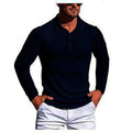 Man wearing a loose fit striped short sleeve knit shirt in light grey.