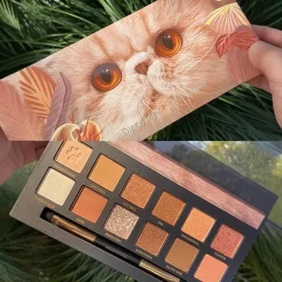 Explorer animal themed eye shadow palette with twelve shades showing cat tiger leopard designs
