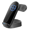 Black and grey foldable 3-in-1 wireless charging stand for phone, watch, and earbuds on a desk.