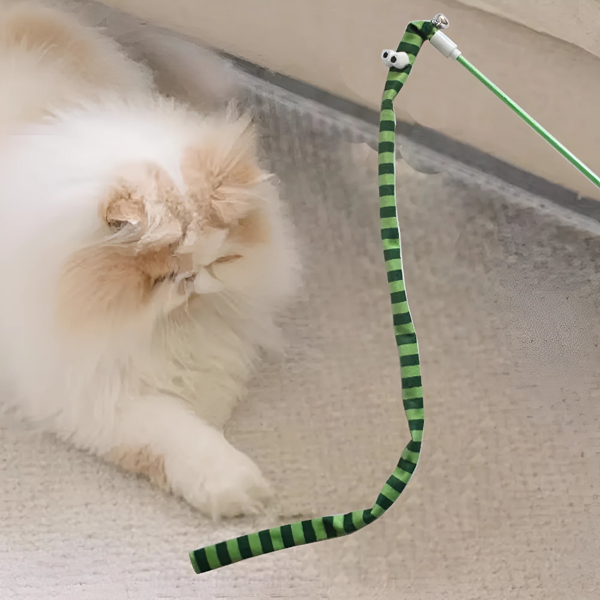 Cat wand toy with polycarbonate pole and long plush strip in green, orange, or rainbow colours