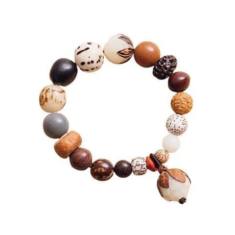 Handmade rudraksha bead bracelet with 18 seeds on a string, showing 16 cm loop.