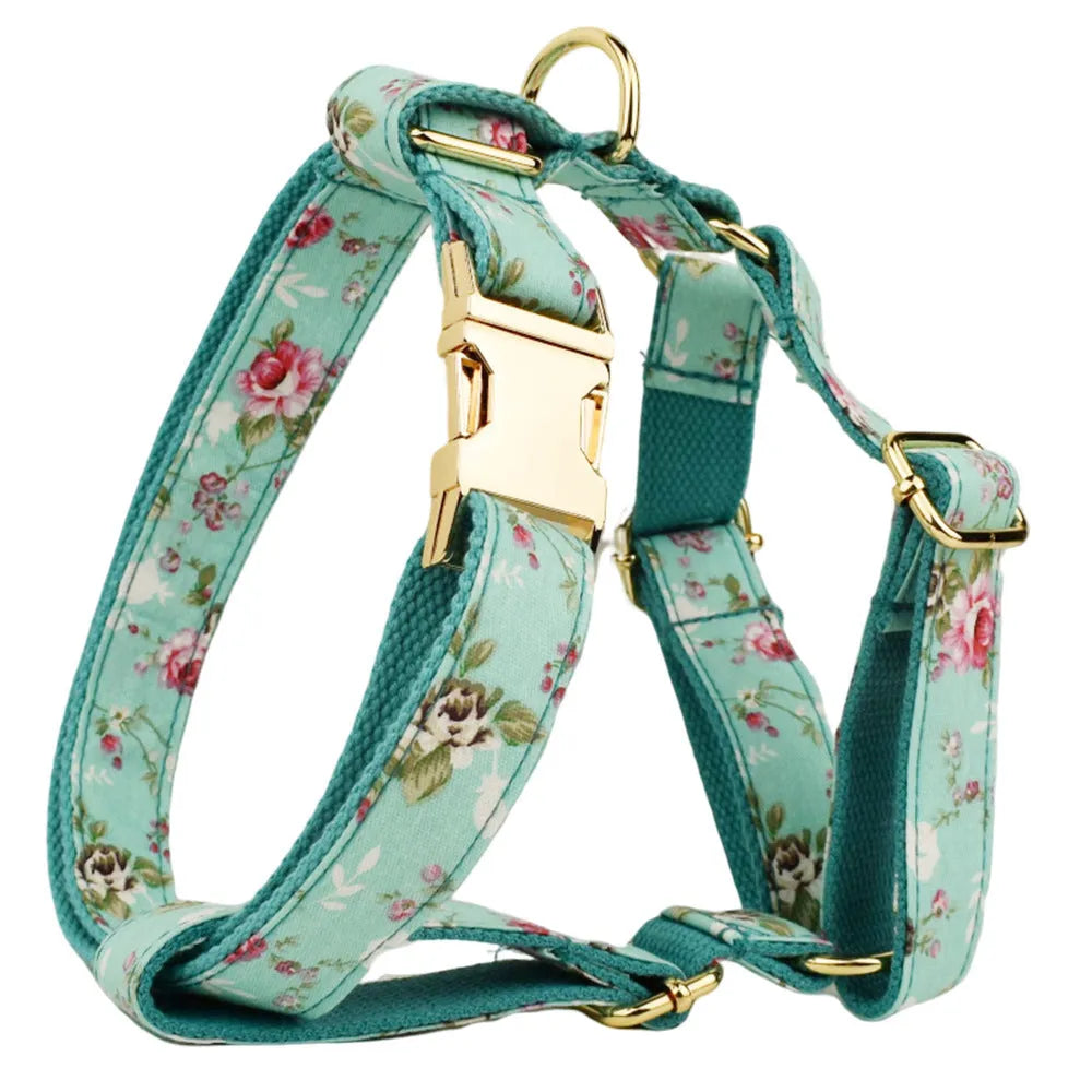 Rose print fabric dog collar set with green detachable bow, leash, and vest for pets
