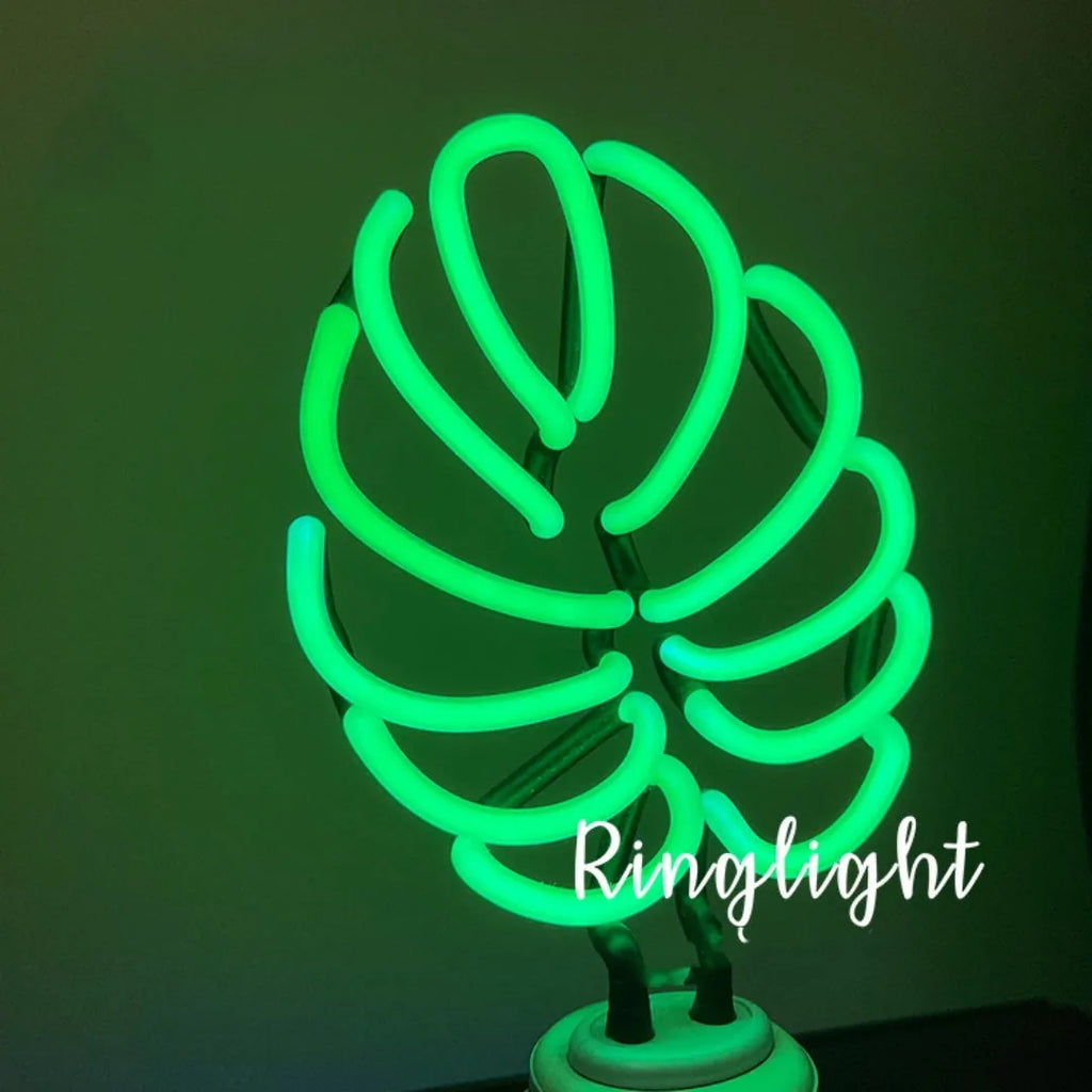 Handmade bamboo-shaped white and green USB desktop lamp in two sizes.