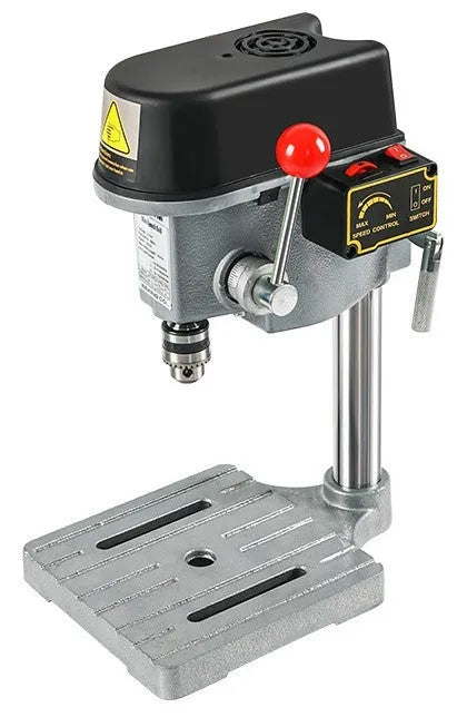 Bench-mounted drilling and milling machine with cross bench pliers and heavy-duty bench pliers.