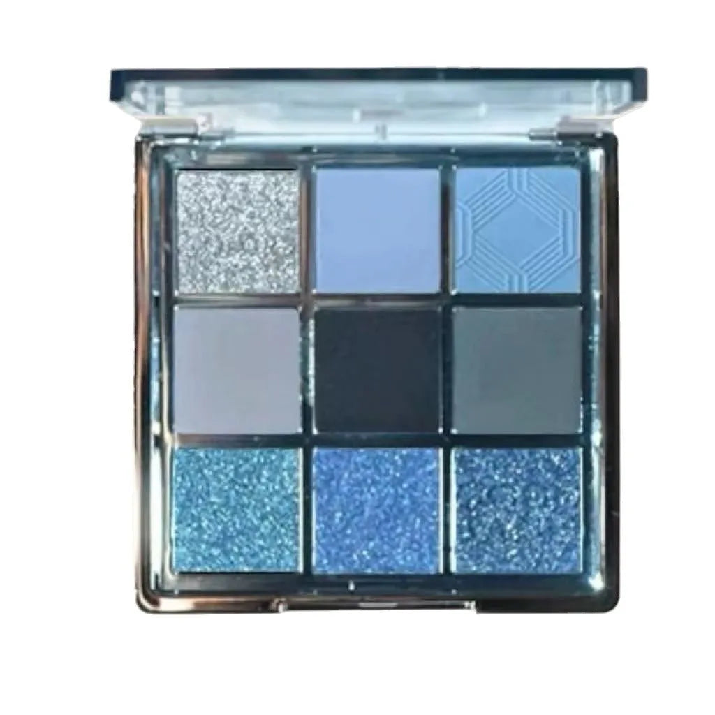 MUGELEEN nine-colour eye shadow palette open showing low saturation blue and complementary shades