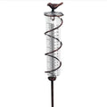 Cast iron bird rain gauge with glass measurement tube showing 0-800ml capacity and 1-20 scale