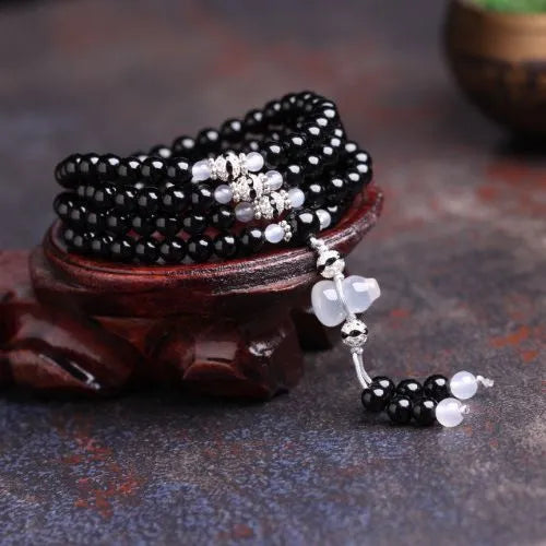 Black agate stone bead bracelet with 108 geometrically shaped beads and number element details