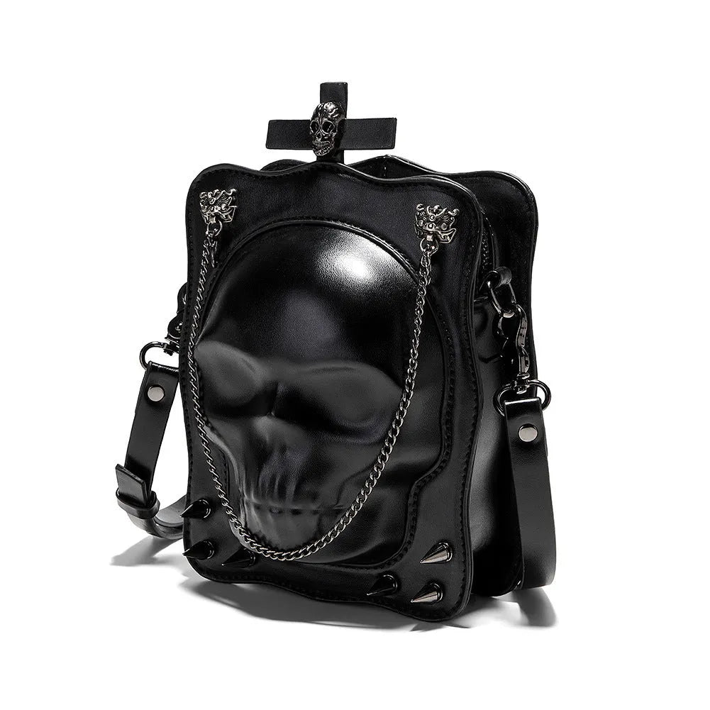 Black PU leather mini square crossbody bag with skull design, metal rivets, chain, and a zip opening.