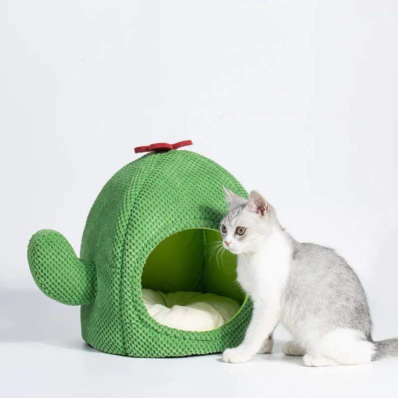 Dark green enclosed tent-style cat bed with soft interior mat for kittens and small dogs