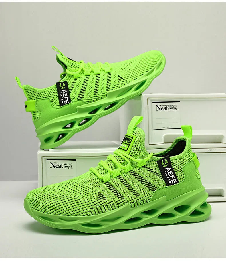 Men's mesh running shoes in black colour with lace-up front and low-top design