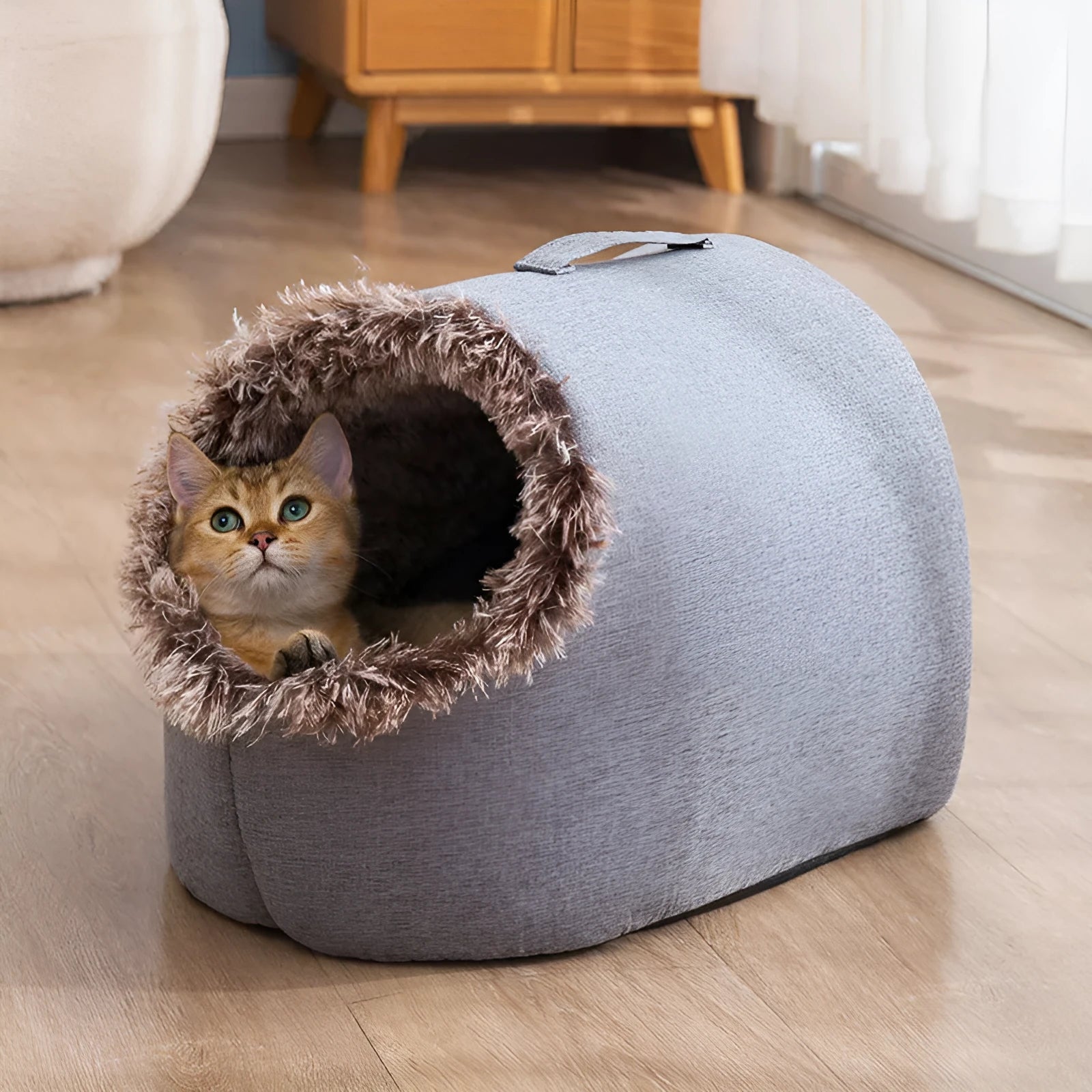 Grey fleece-lined enclosed cat sleeping bag nest showing closed design with warm interior