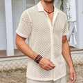 Men's beige short sleeve mesh cardigan shirt with lapel collar laid flat.