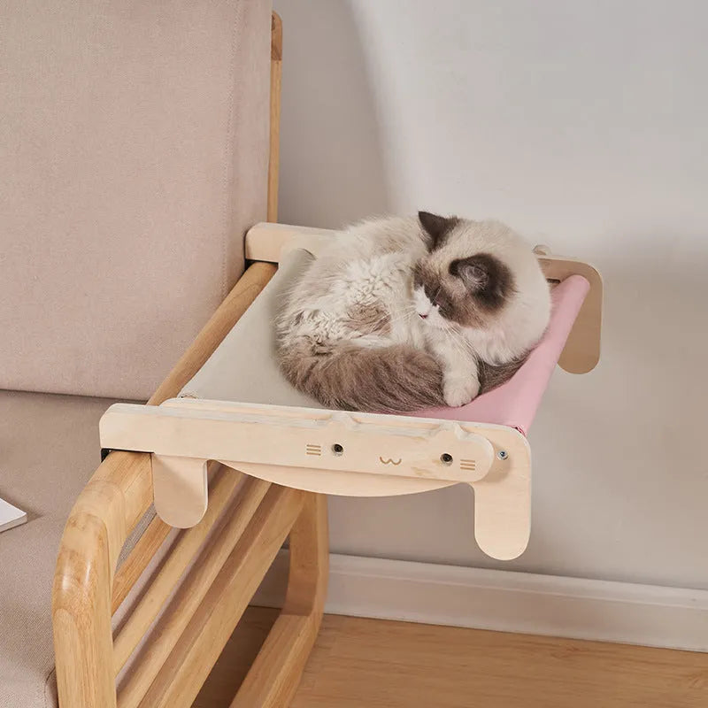 Solid wooden cat bed with removable fabric cover in selected colour option