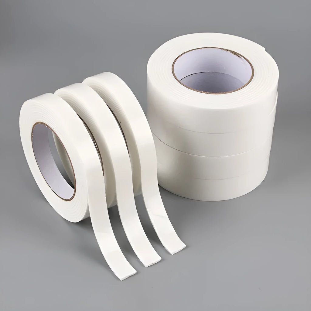 Roll of white foam double-sided adhesive tape showing its thickness, with size options 15mm, 18mm, and 30mm wide.