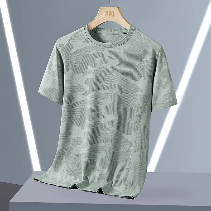 Men's camouflage pattern nylon summer t-shirt with round neck and short sleeves in loose fit.