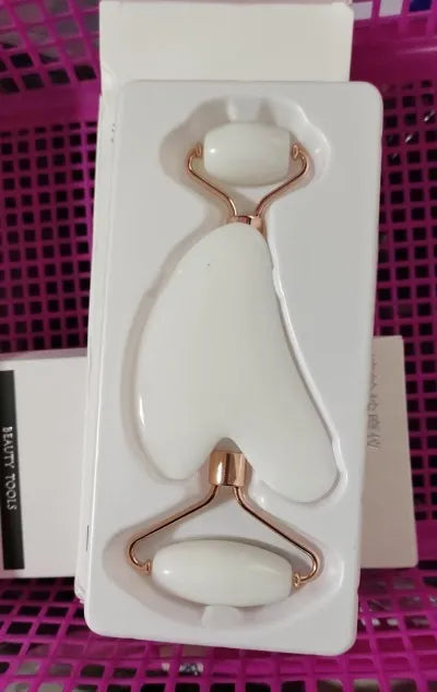 Two-piece resin gua sha roller set for face massage in black, pink, and green jade handle options