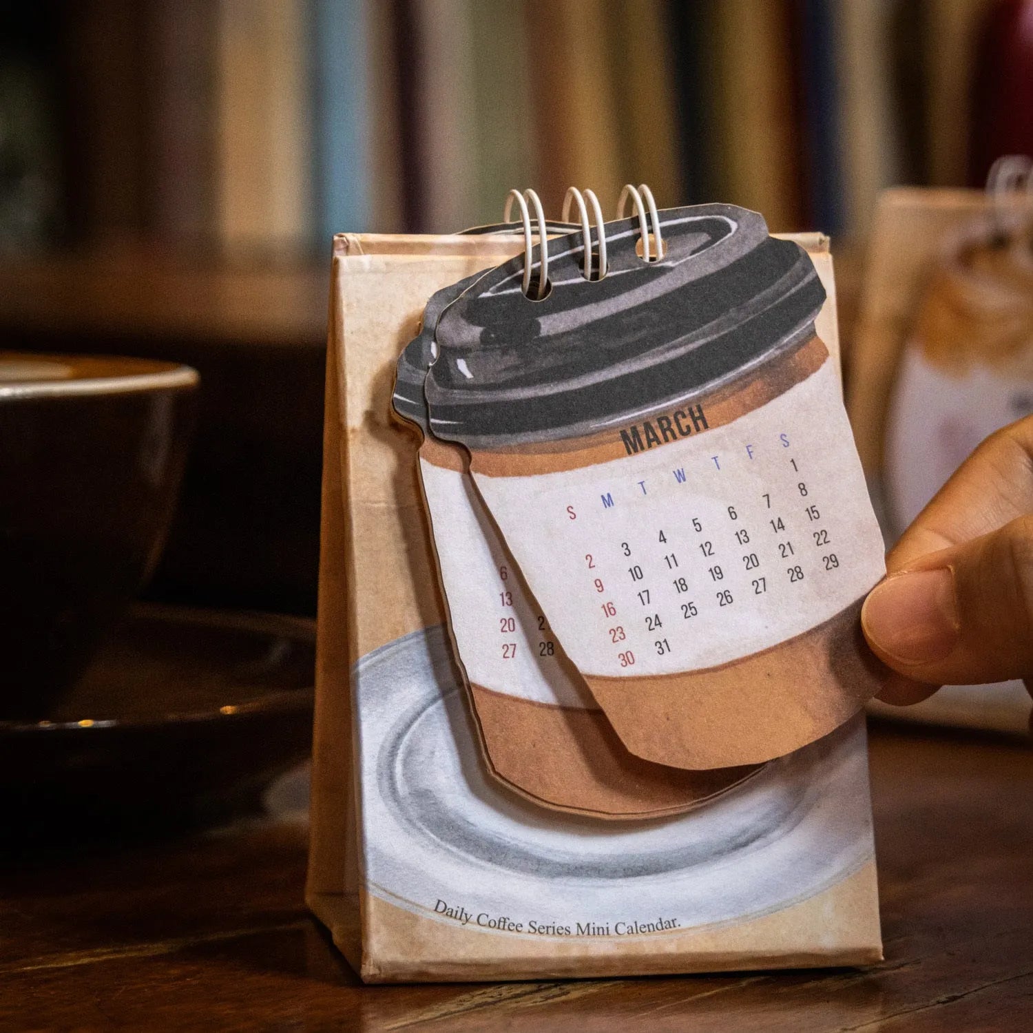 2025 mini desk calendar collection showing four different simple modern design themes