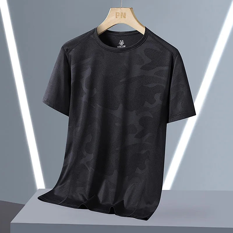 Men's camouflage pattern nylon summer t-shirt with round neck and short sleeves in loose fit.