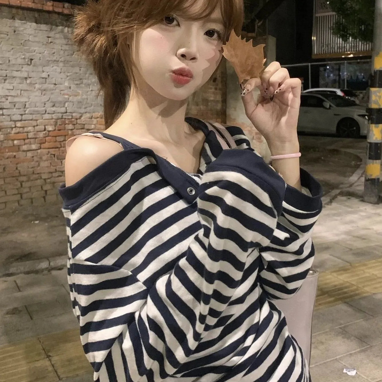 Dark blue Korean-style women's oversized t-shirt with embroidery details and long sleeves