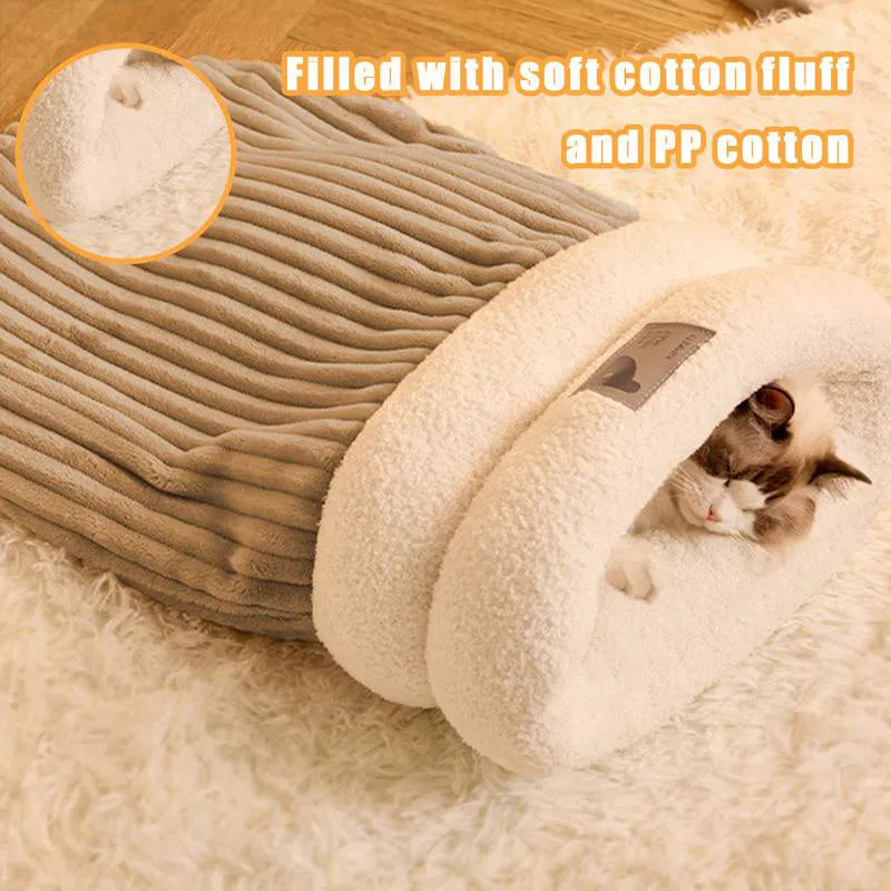 Brown semi-enclosed plush pet sleeping bag for cats on a wooden floor