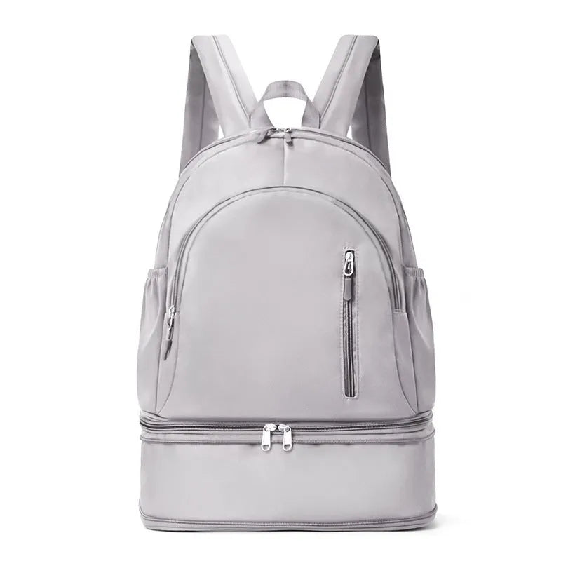 Women's casual backpack in polyester with curved shoulder straps showing decorative stitching details