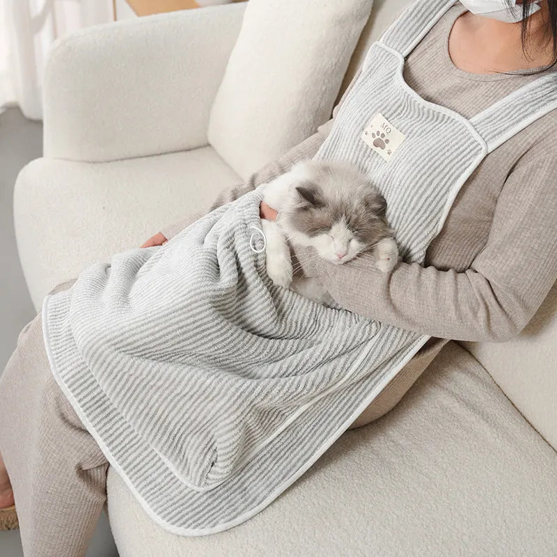 Cat petting apron in multiple colour options including pink, light blue, and striped patterns for grooming protection
