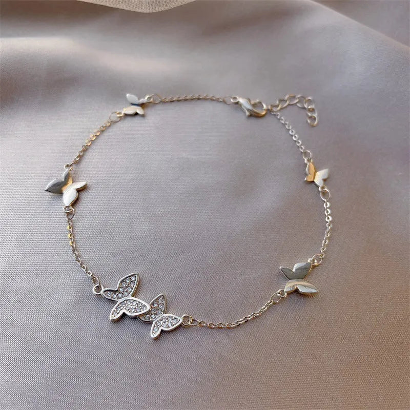 Women's zircon flower bracelet in titanium steel with gold adjustable waist and geometric design