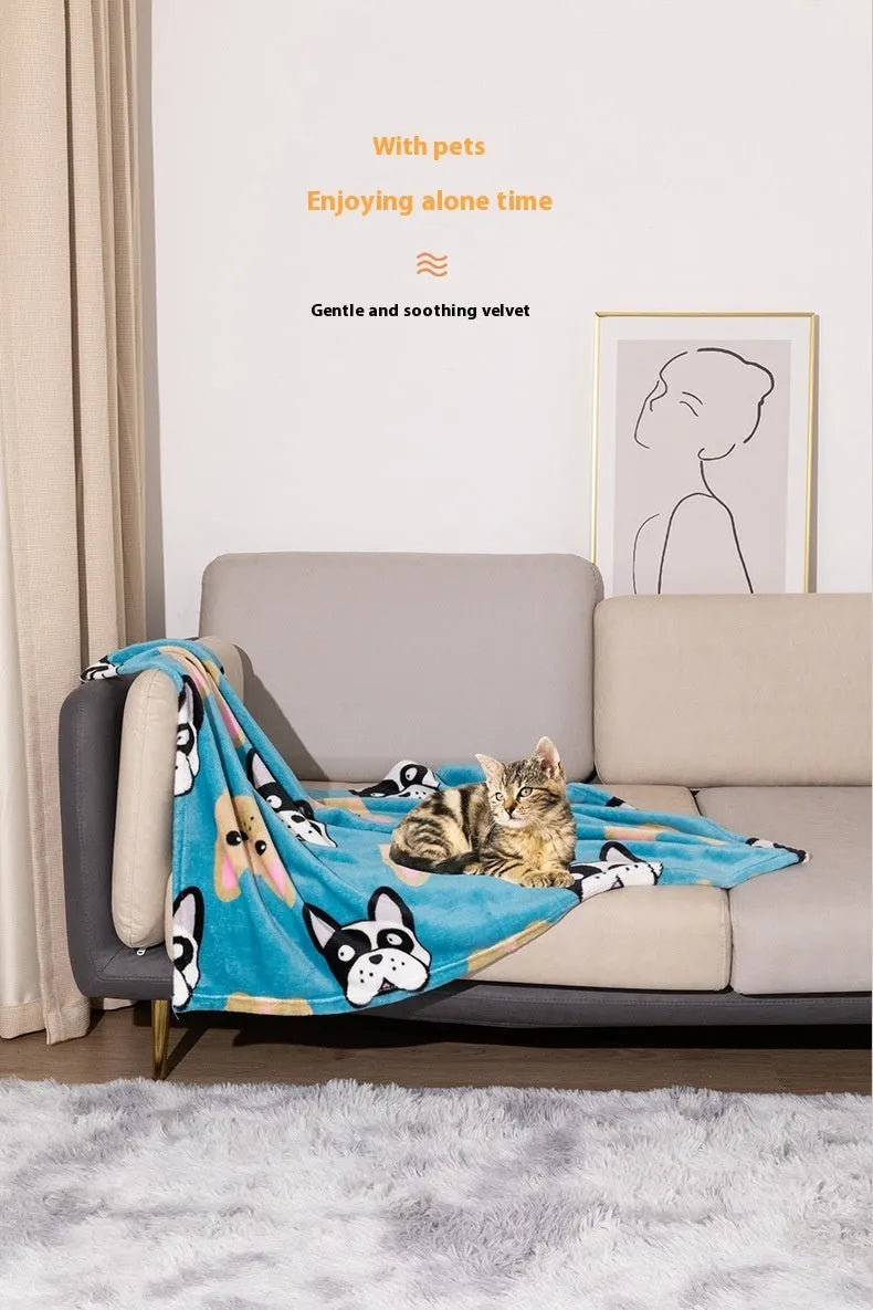 Blue cartoon dog pattern on a double-sided thickened flannel pet blanket laid flat.