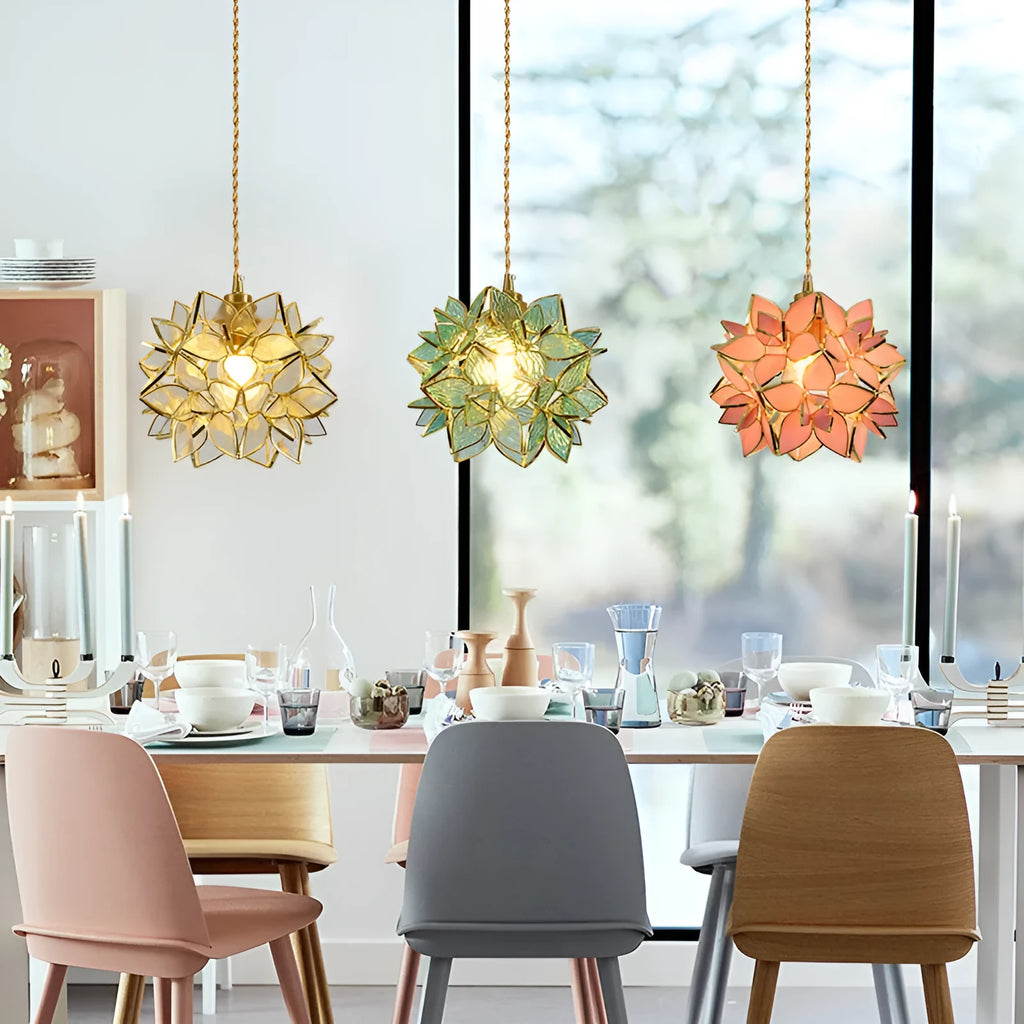 Stained glass line chandelier hanging from ceiling with colourful glass shades and copper lamp head
