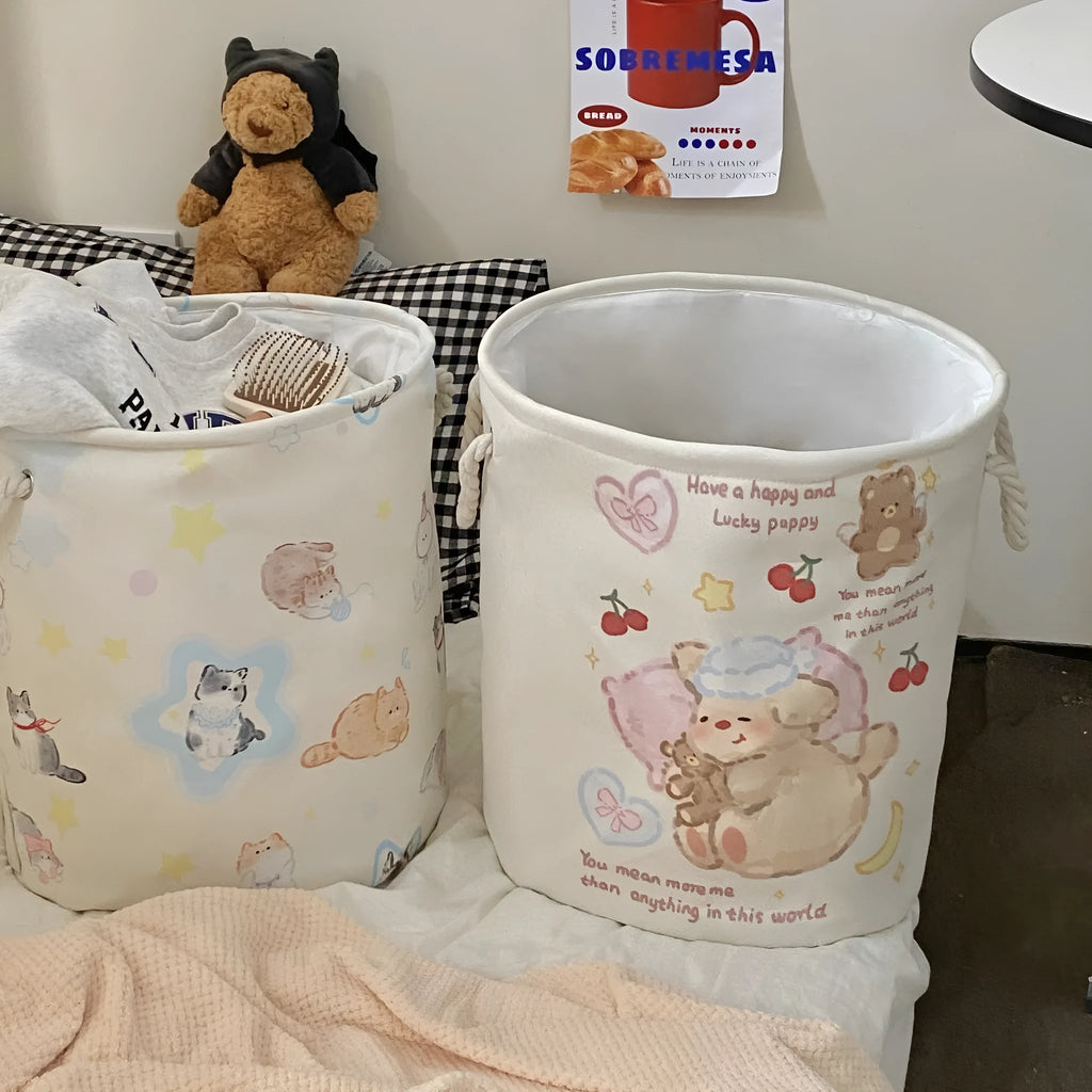 Foldable cotton cloth laundry basket in a choice of colours like puppy print or mint green.