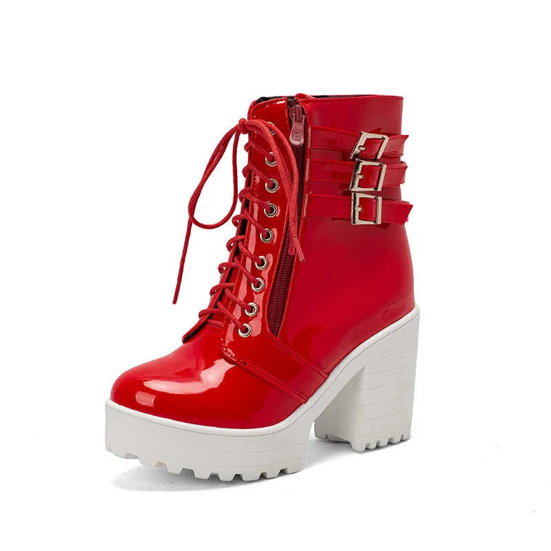 Women's black thick-heeled lace-up ankle boots with a round toe and waterproof platform sole.