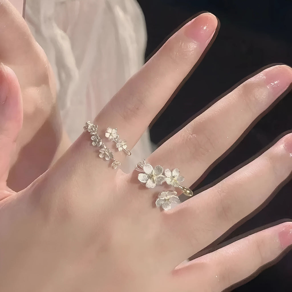 3D jasmine flower fashion ring with open mouth design and electroplated finish.