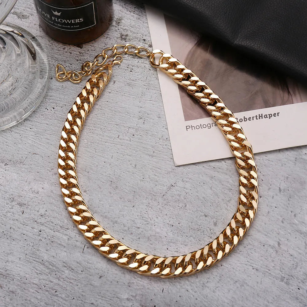 Women's gold thick chain necklace with a simple solid colour design, 32cm long.