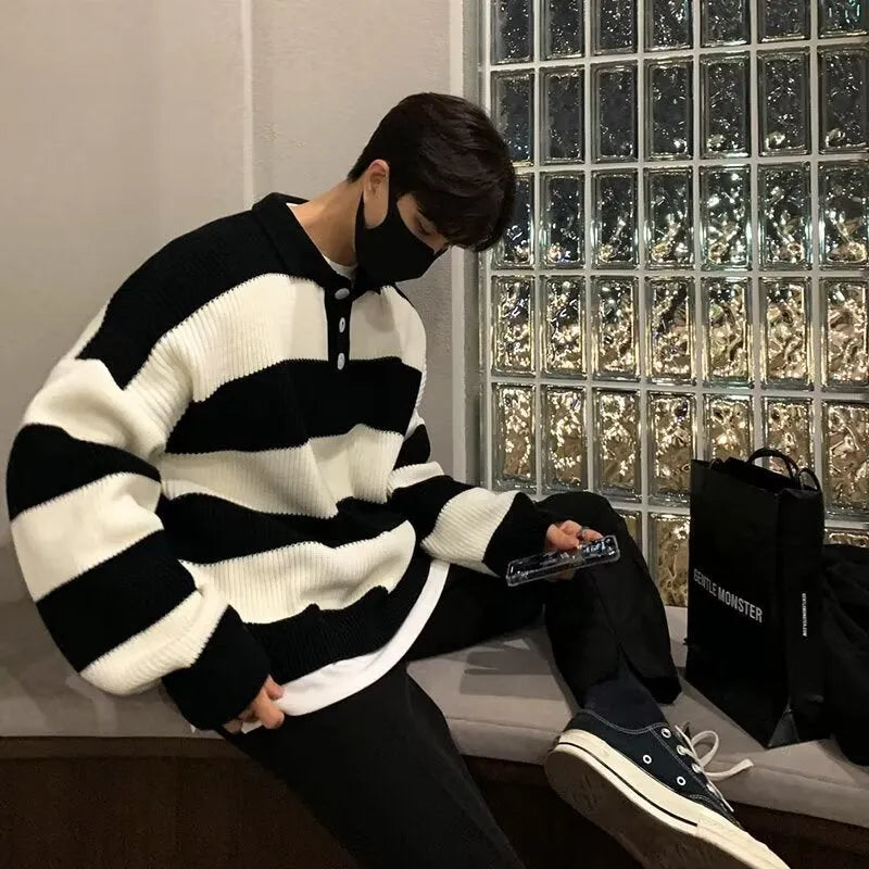 Men's loose striped sweater coat in black and grey colours with pullover design