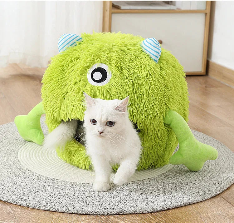 Round fluffy cat bed with plush surface and non-slip bottom in three size options