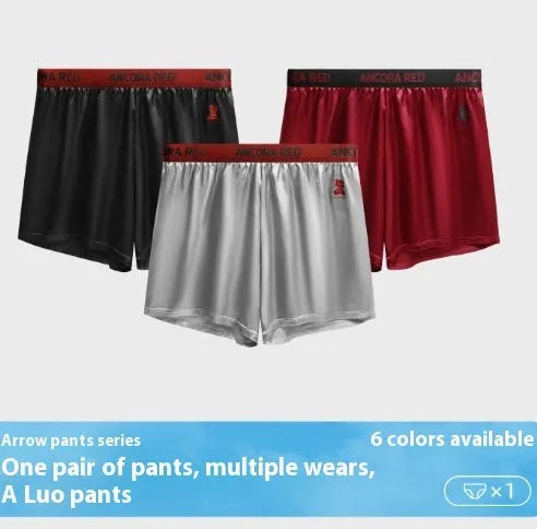 Solid colour men's boxer briefs in black, red, blue, silver, purple, and brown on a mid-waist fit.